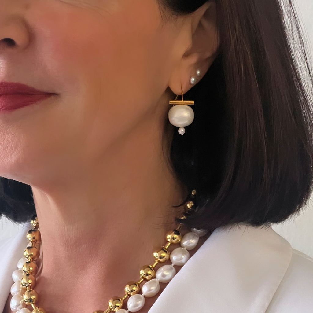 Pearl Pebble Dot earrings in model