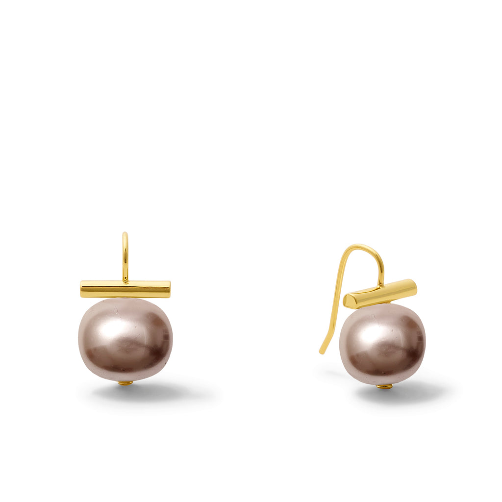 A pair of medium-sized periwinkle pebble pearl earrings with gold-colored hooks