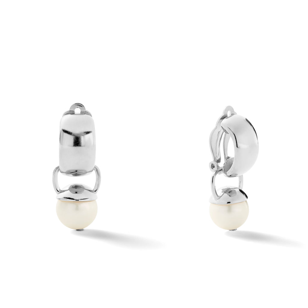 The image shows a pair of sterling silver ear clips with detachable white pearl drops. The ear clips have a smooth, sculpted design on top and a paddle backing.